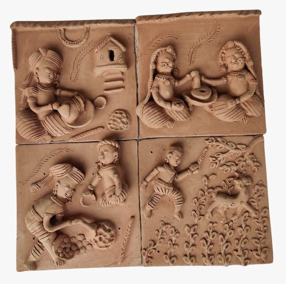 Village in a nutshell miniature terracotta plaques