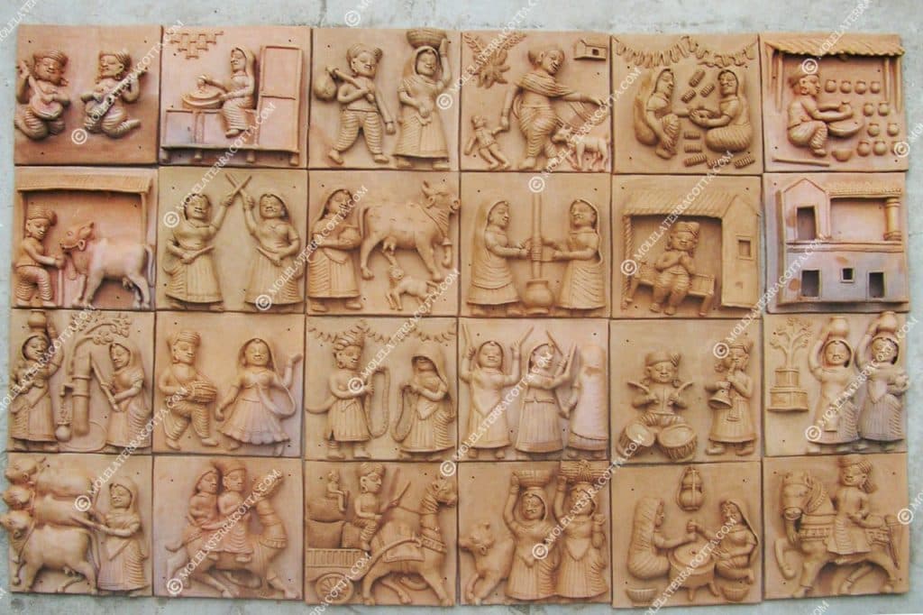 Fire-baked earthen figurines and hollow relief plaques from Molela studio