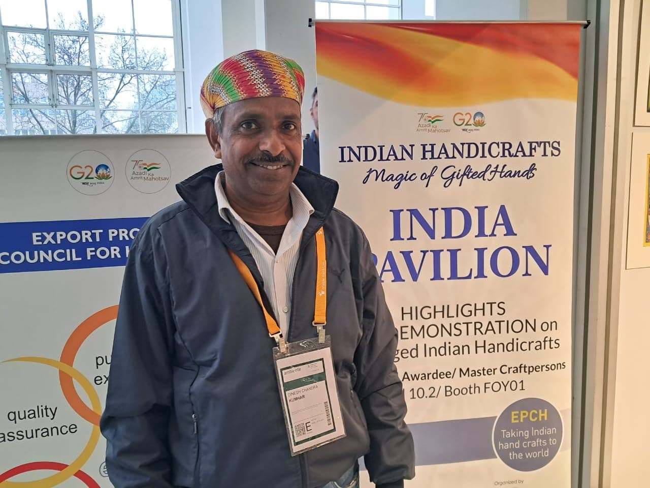 Dinesh Chandra Kumhar demonstrating GI-tagged Molela terracotta at Frankfurt Messe in Germany