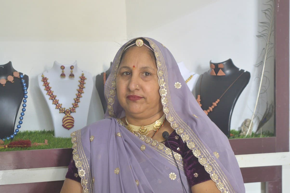 Kailash Devi showcasing handcrafted Mridika terracotta jewellery collections in her studio showroom in Molela