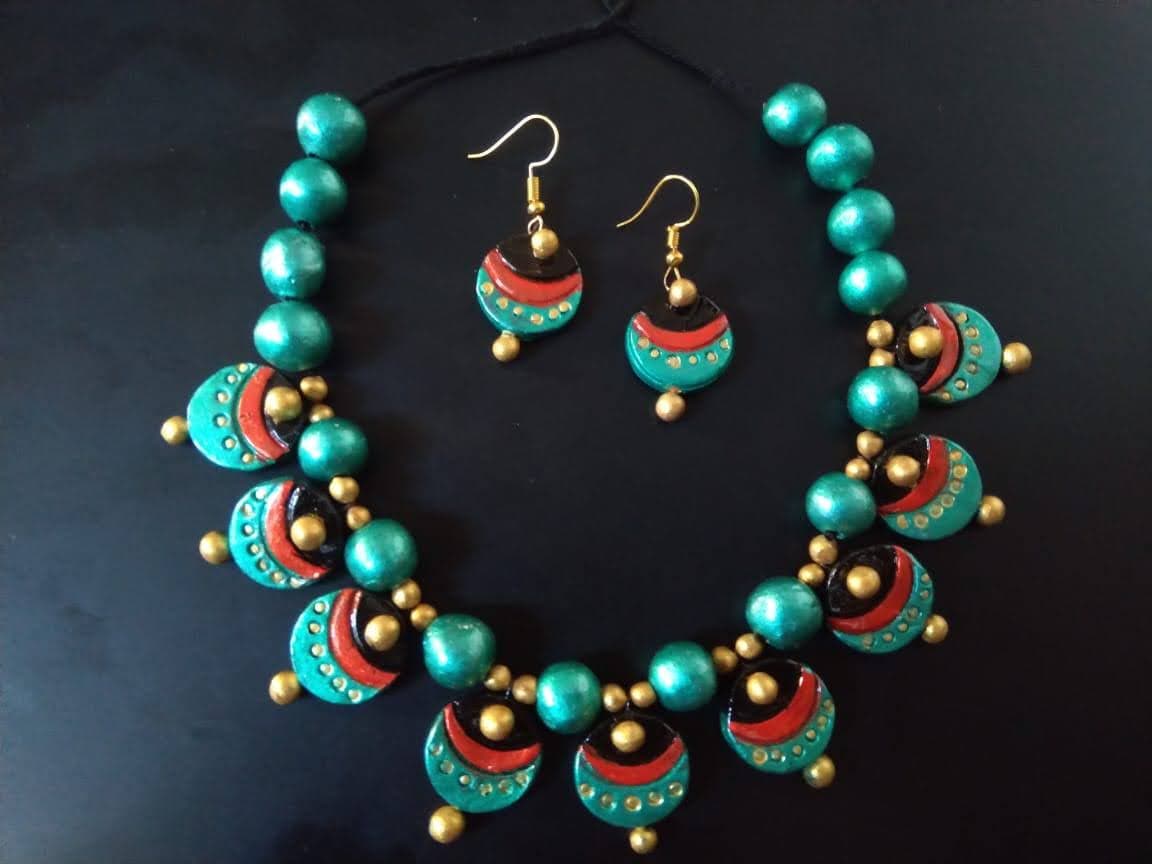 Turquoise and terracotta medallion necklace set with earrings
