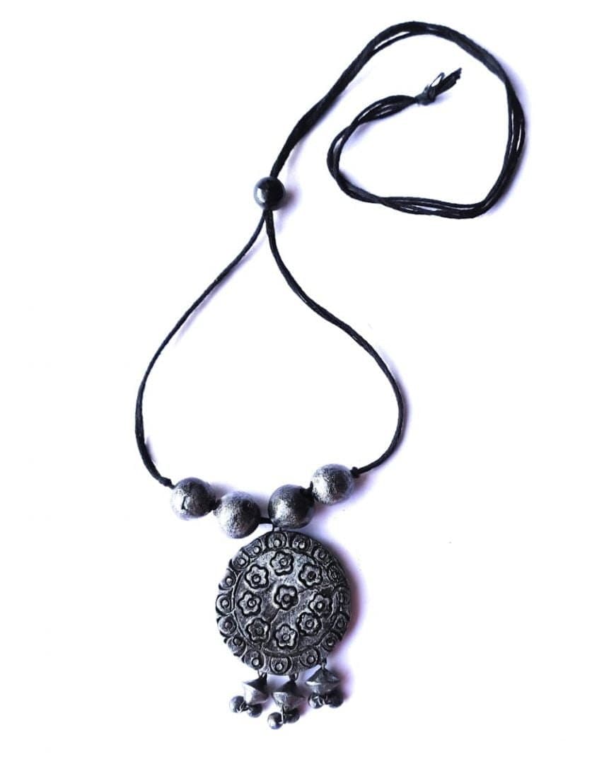 Terracotta necklace with a metal pendant